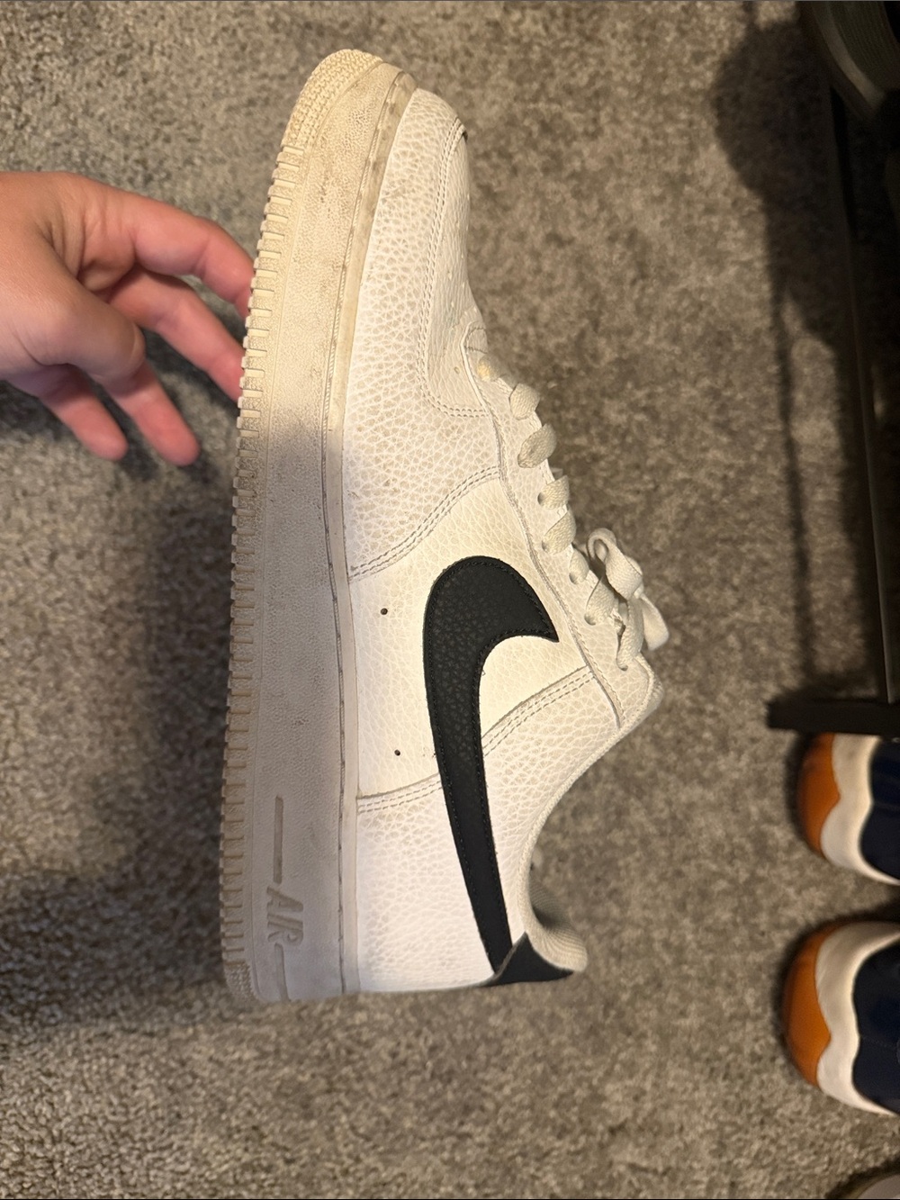Nike Kids White Sneakers with Black Swoosh Accent
